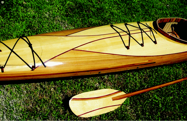 Purpleheart provides a nice contrast for the outline of the deck design and deck hardware on the Guillemot Kayak.