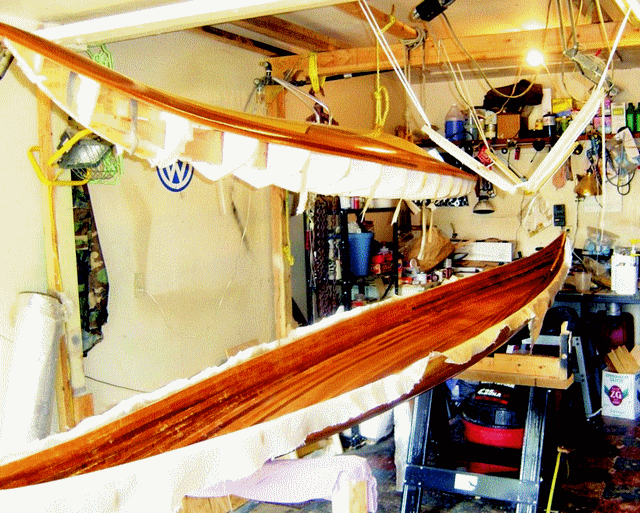 The inside of the Guillemot Kayak's hull is glassed with 6 oz fiberglass cloth. Havel used 105/207 to wet out the cloth in temperatures over 100 degrees F.