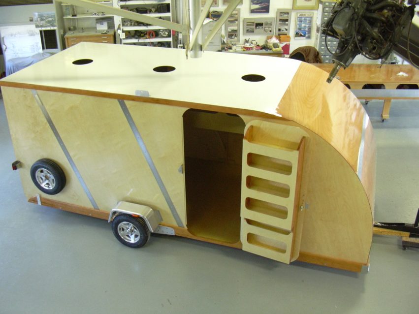 The hinged door was designed to have storage compartments to haul any hand tools needed at the race track. The finished enclosed trailer weighed around 1,200 lbs.