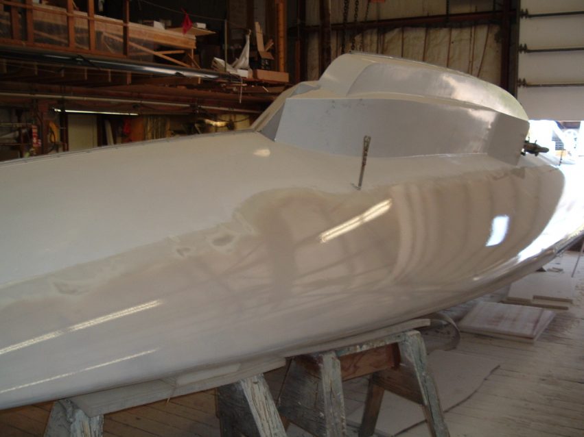 Photo I: I waited until the previous coat had tacked up before the next step in fairing the bottom.