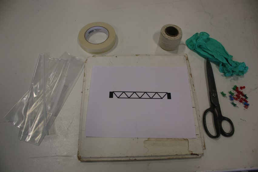Composites merit badge bridge project materials assembled.