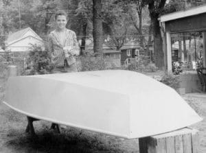 The plywood sharpie is Captain JR Watson's latest boat. Here he is with a plywood dinghy at age 12.