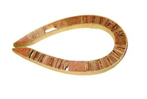 Plywood selection weighs flexibility vs. stiffness. The wing mast required flexibility. A trimaran interior shows varied uses of plywood selected for their appropriate stiffness and finish.