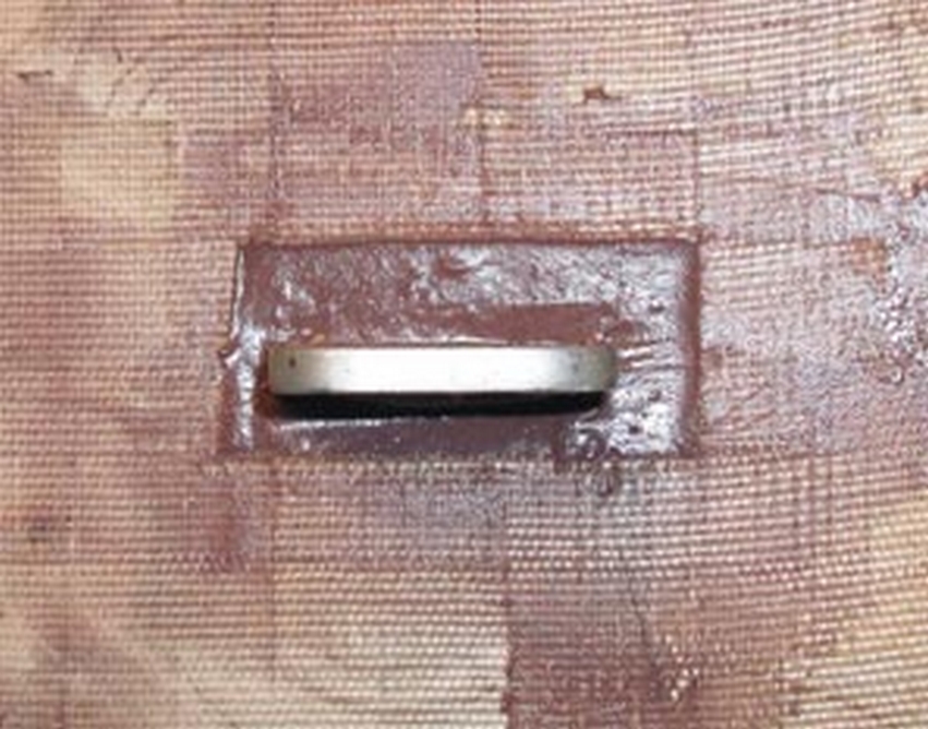 A gap between the chainplate and the new core was filled with bedding mixture to isolate the core from any water that may leak along the chainplate.