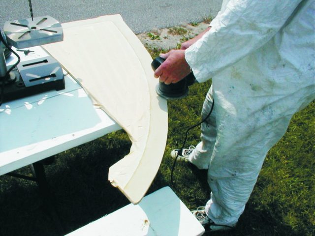 We used the old bulkhead as a template to layout the new bulkhead, and then sanded the edges of the new G-10 bulkhead to prepare the surfaces where the new tabbing will be bonded.