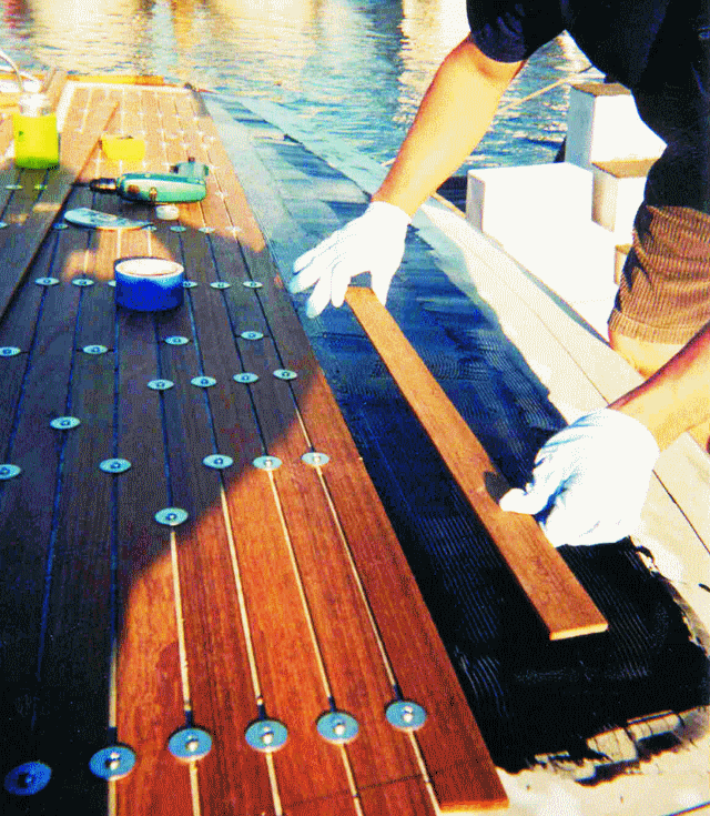 Installing planks back in their original position.