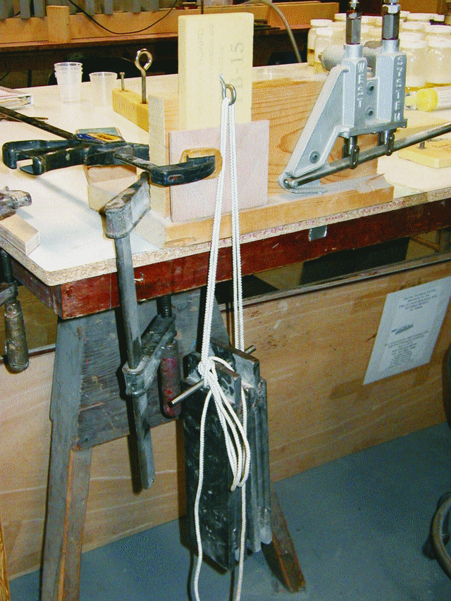 The dramatic difference in load carrying capacity quickly became apparent when Bruce applied a 40 pound weight to the eyebolt bonded into the high-density-urethane foam.