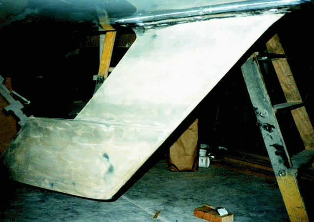I used epoxy/ 410 Microlight™ to fair the International 110's hull and extensively fair the keel to the correct shape.