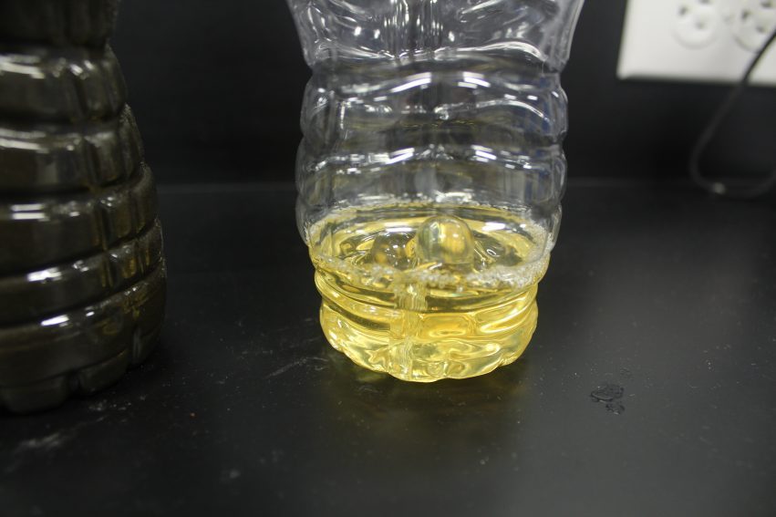 A 1" deep pour (70 grams) of 105/206 in an 18 oz. bottle reached 410 F, cracked and deformed the bottle as a result of uncontrolled exotherm.