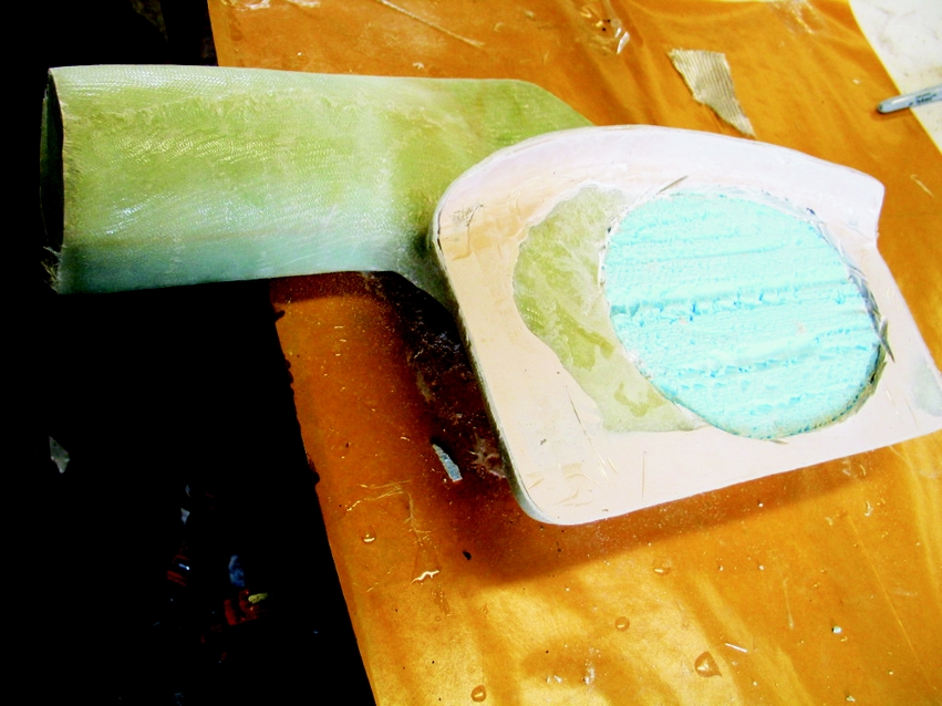 4: The cured part and mold from below before the foam was dissolved with lacquer thinner.