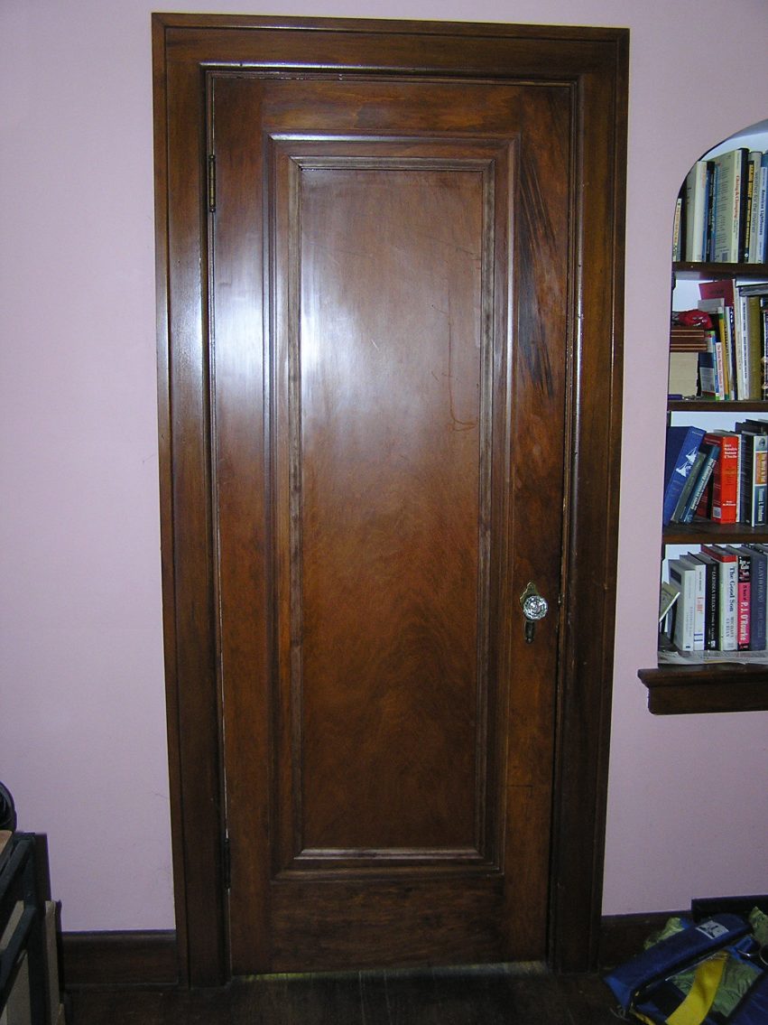 Repaired door, completed and rehung in place.