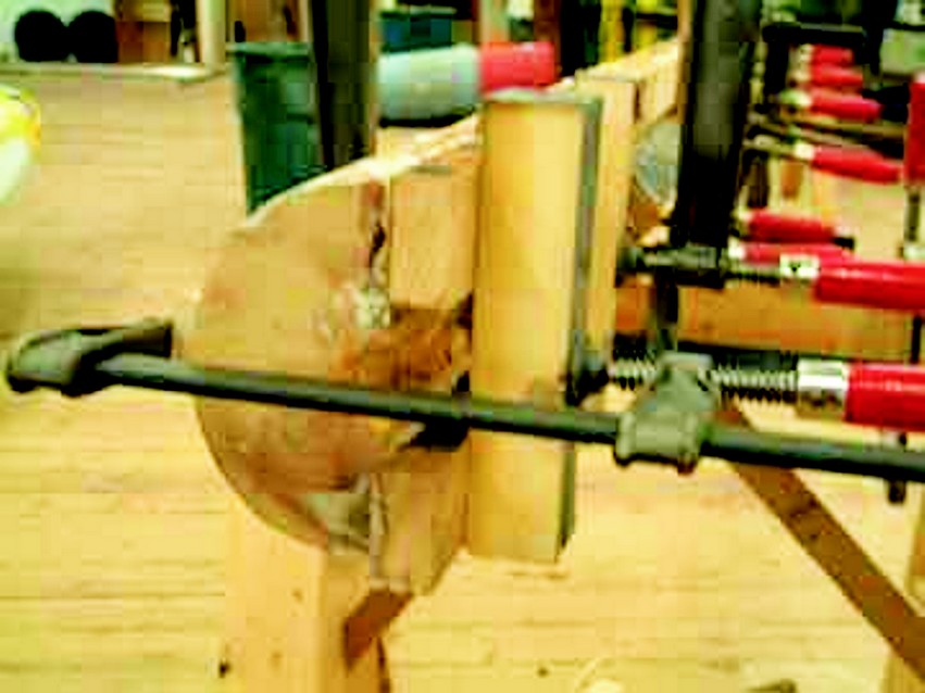 A 1" x 2 1/2" piece of sitka spruce was glued to each side of he cleaned-up fore topmast half to reproduce a hollow area in the center.