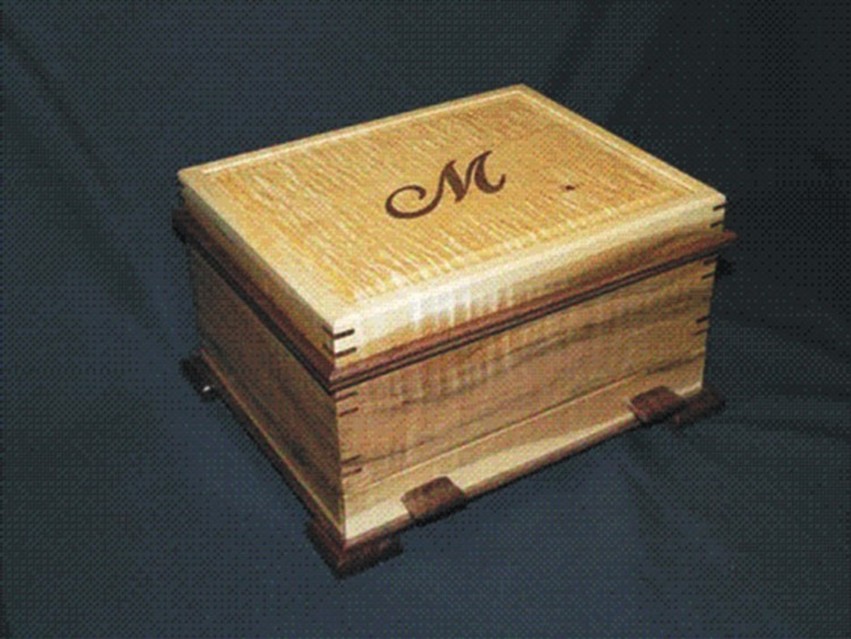 A beautiful example of a completed jewelry box with inlaid top.