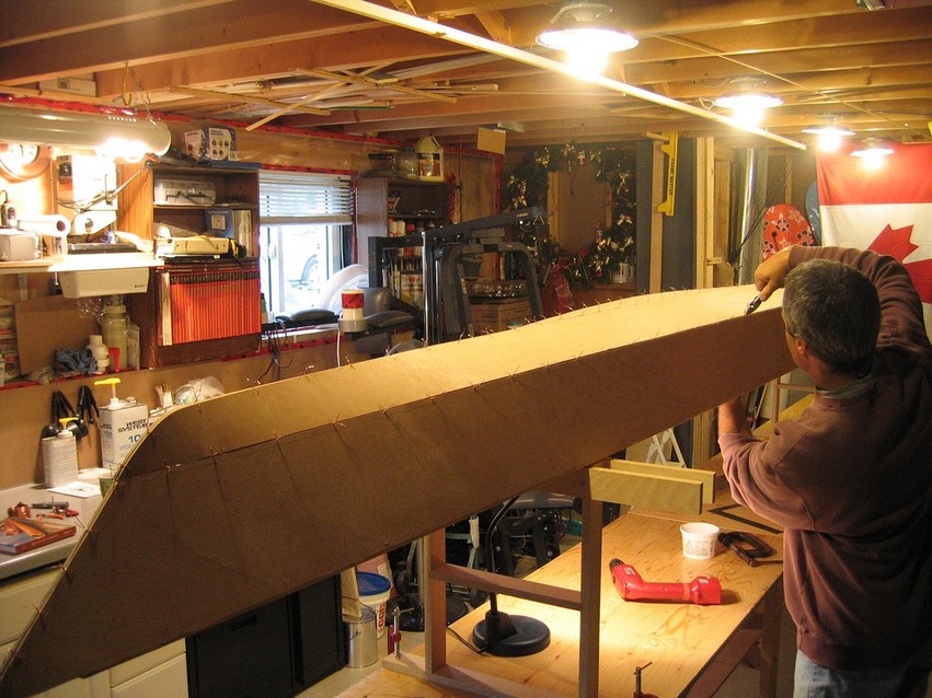 Simple forms hold the kayak and a comfortable working height.
