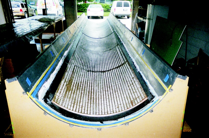 The cured outer carbon skin with foam core.