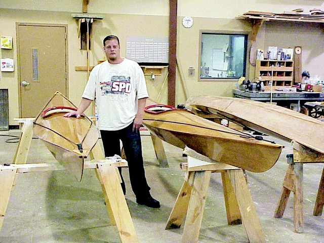 Aaron Gnirk shows off the stitch-and-glue kayaks he's built. It's the student's own design, using 3mm and 6mm plywood encapsulated with WEST SYSTEM Epoxy and 6oz fiberglass cloth.