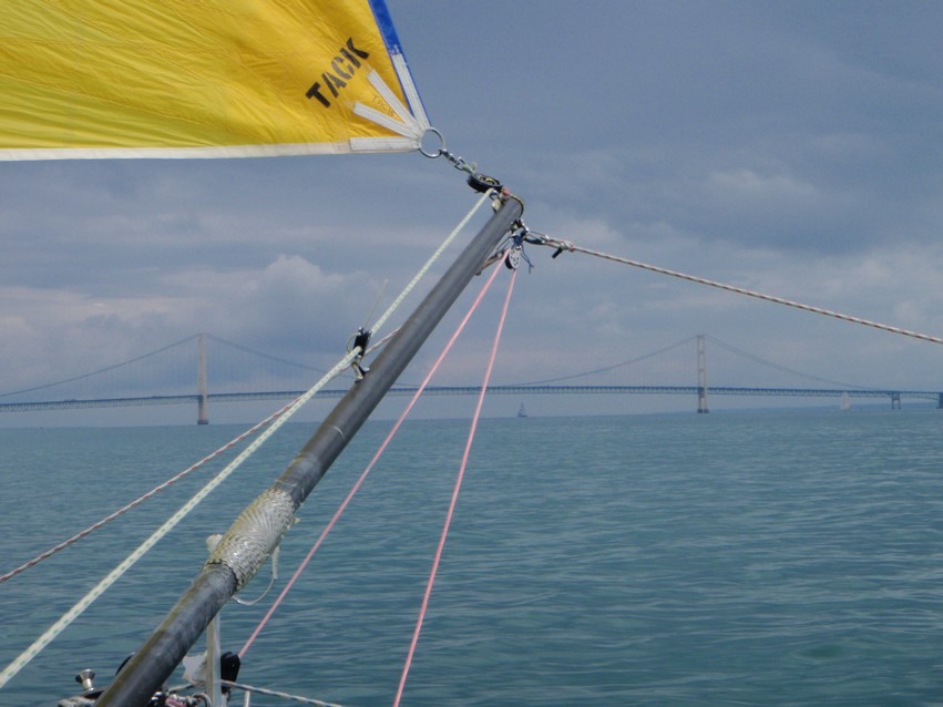 The broken spinnaker pole is repaired and back in action as Adagio approaches the Mackinac Bridge.