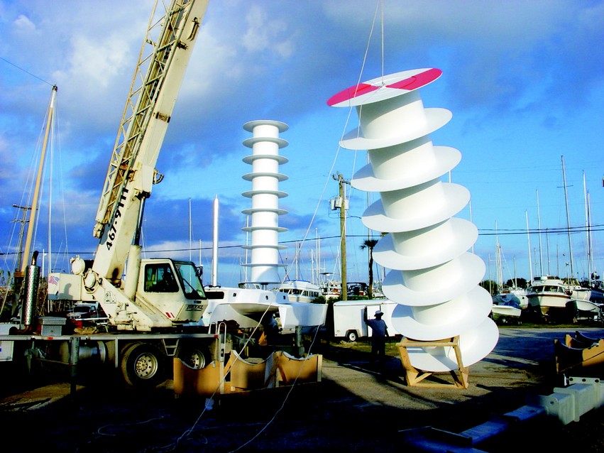 The rotor is lifted by the eye-bolt in the top bulkhead. Note the "tilt-up fixture" to prevent damage to the fences.