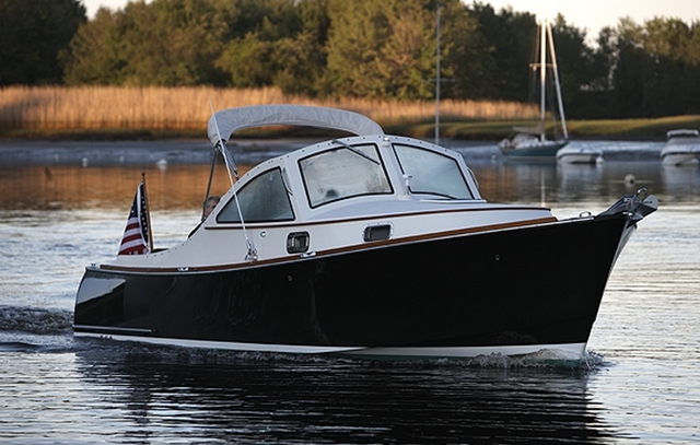 Layers of marine plywood and Western Red Cedar laminated with WEST SYSTEM Epoxy form a stiff and quiet hull.