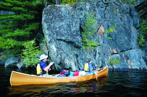 One reason people build boats is that they give you the opportunity to find beauty in otherwise inaccessible places. Paddlers in a 16' Prospector check out an amazing faulted rock formation in northwestern Quebec, September 2008.