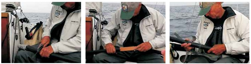 Meade Gougeon fixing ADAGIO's broken spinnaker pole while underway in a regatta.