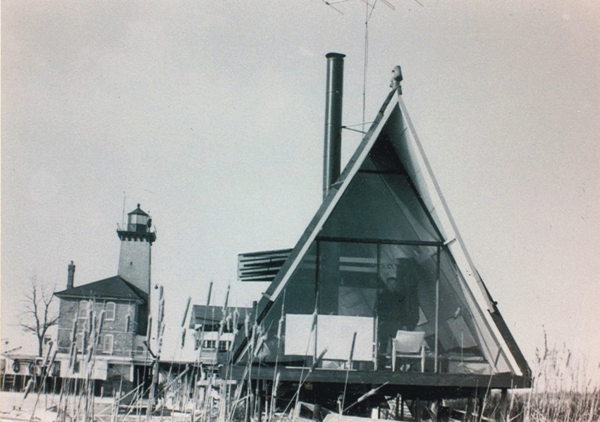 Looking back at Jack Taylor's with the Coast Guard Station and Saginaw River Rear Range Light in the background.