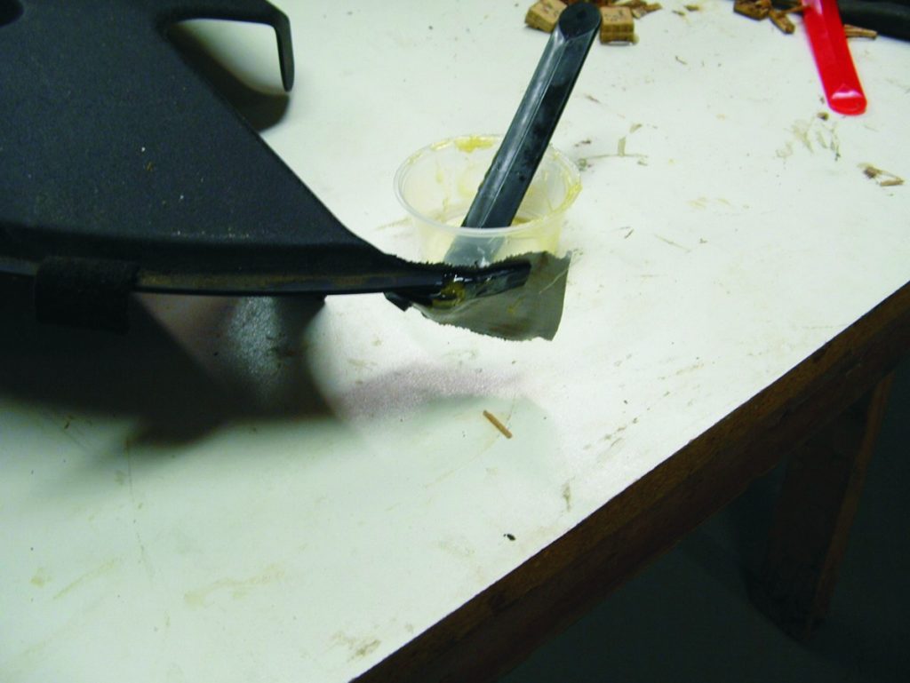 Fixing the broken tab with G/flex 655 and flame treating.