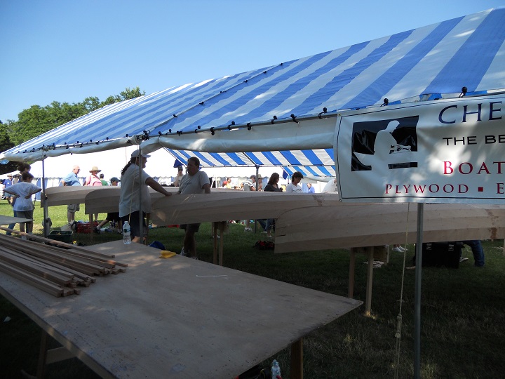 With the copper stitching removed and the outer lap joints filleted, the hulls are ready to be rolled upright again to install the inwales and outwales before the end of day two.