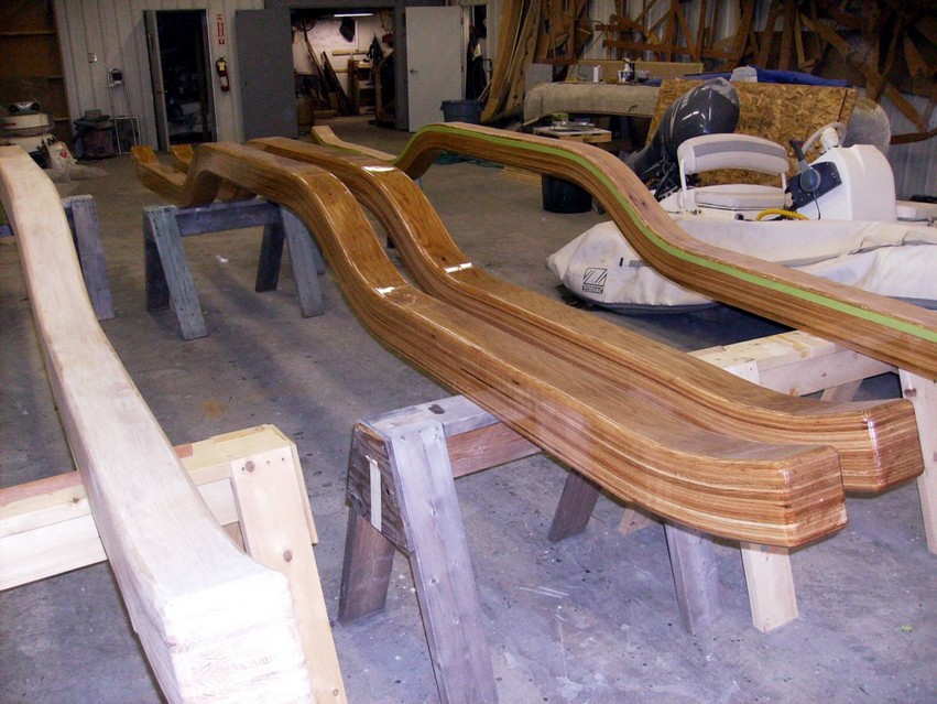 Completed iakos (beams) are getting final coatings of West System 105/207.