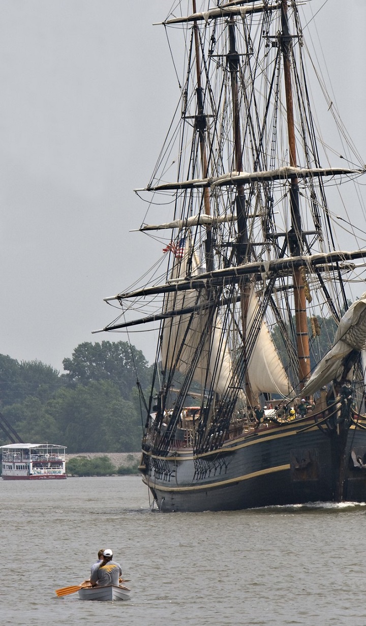 Nick and Bruce paddle out to greet the HMS Bounty as it heads up the Saginaw River to the Tall Ships Festival.