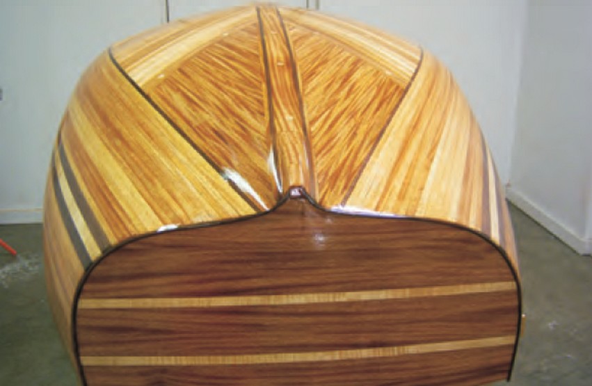 Bottom detail showing African mahogany with accents of Tennessee walnut and maple.