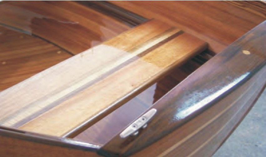 A detail of the strip-planked dinghy's transom.