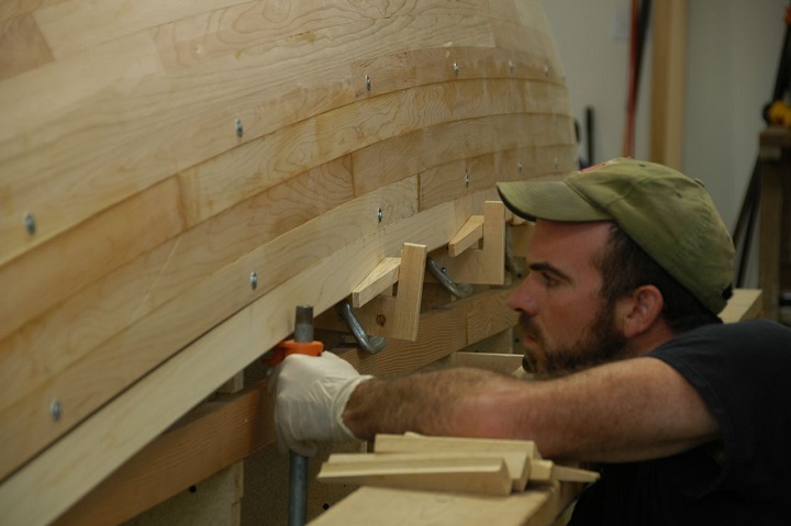 We used screws and fender washers to hold the planks only if the hull started to come away from the mold.
