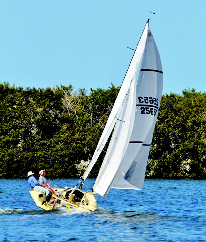 Meade and Jan shake down the completed i550 sportboat Hot Canary in Florida prior to the race.