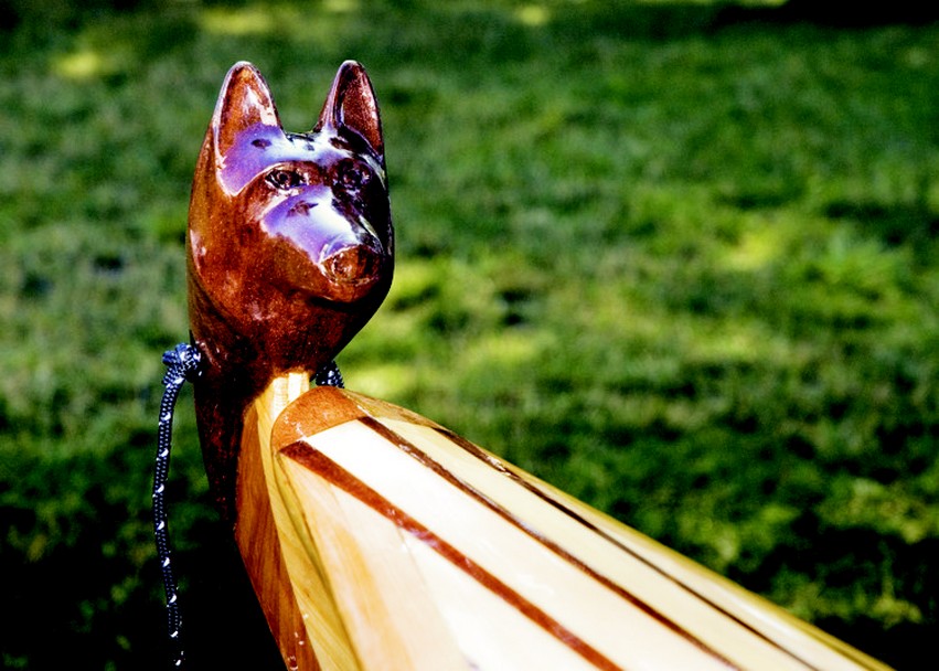 The figurehead is a classic baidarka-style kayak detail. THERAPY's depicts Curtis's 15-year-old husky, Boz.
