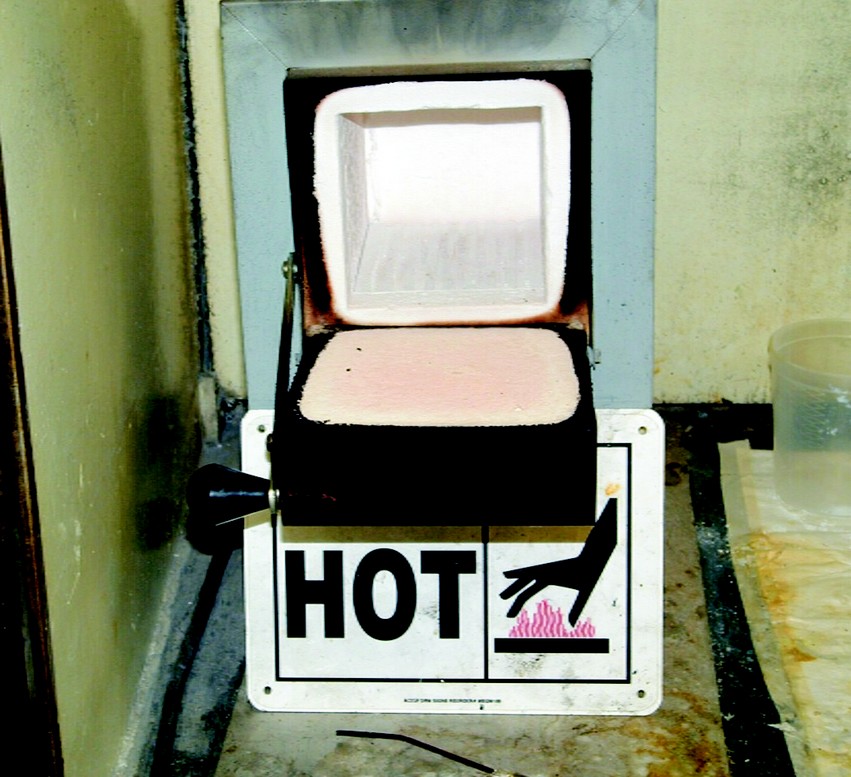 A high-temperature oven is used to bake the resin out of a laminate.