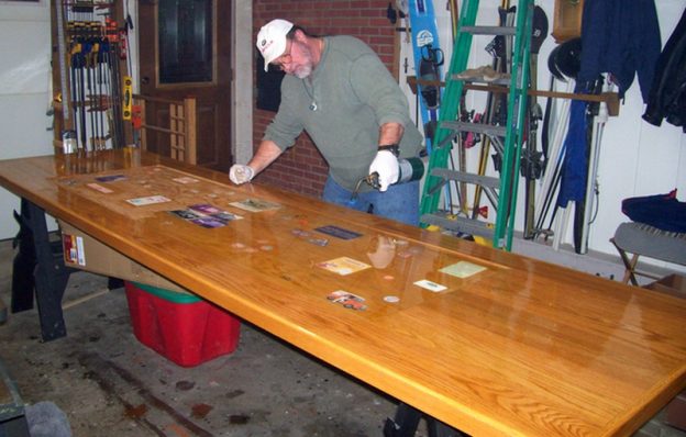 Bruce torches the bubbles out of a poured epoxy coating