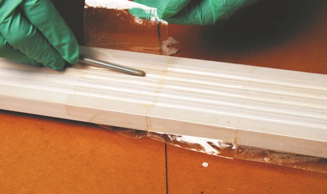 Cover the area you are taking the mold from with 2" wide cellophane packaging tape.