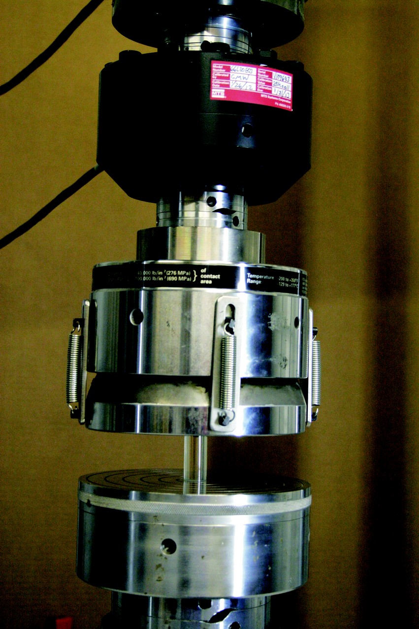 Epoxy compression test in progress.