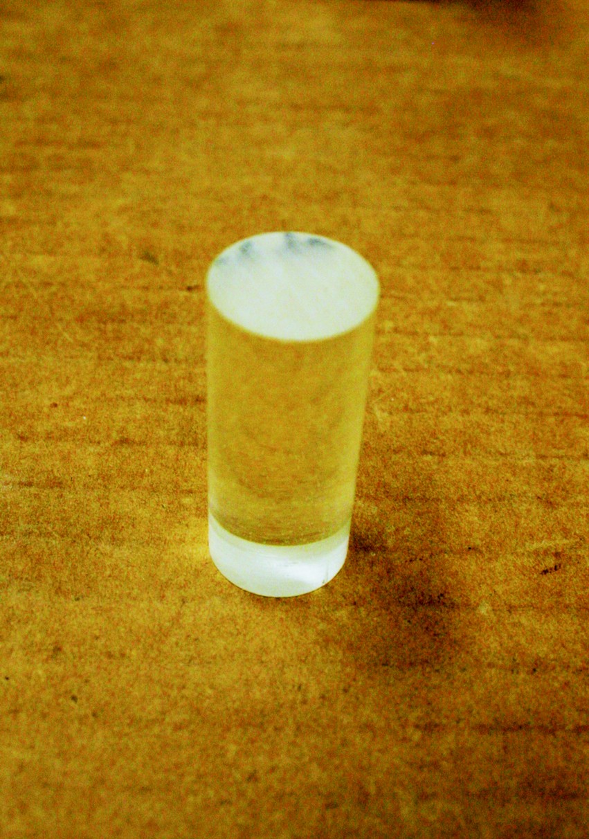 A compression cylinder of epoxy after testing.