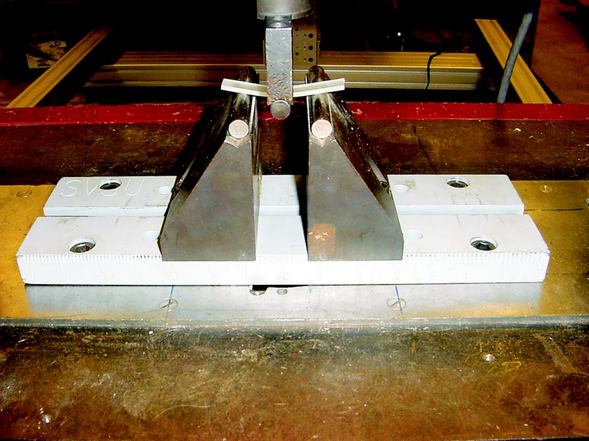 An epoxy flexure test in progress.