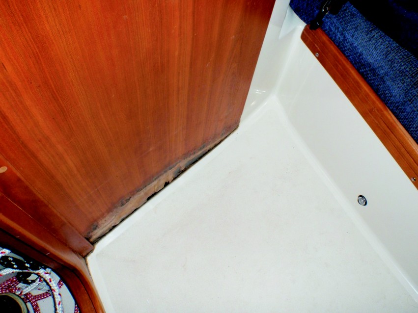 3. Complete rot -though in the aft cabin. Water dripped through the closed hatch during rainstorms. Note the halyards in the lower-left corner. These can wick water down their length sometimes as well. The next photo describes the problem in more detail.