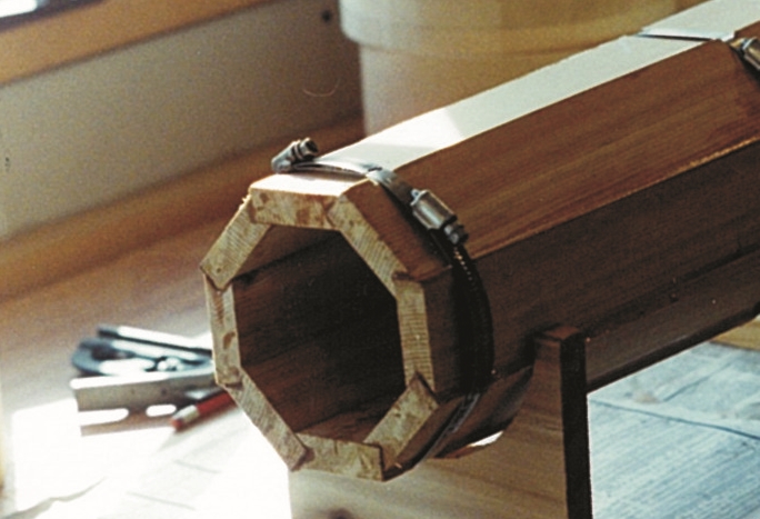 The birdsmouth joints are visible in this end view of the custom lantern post.