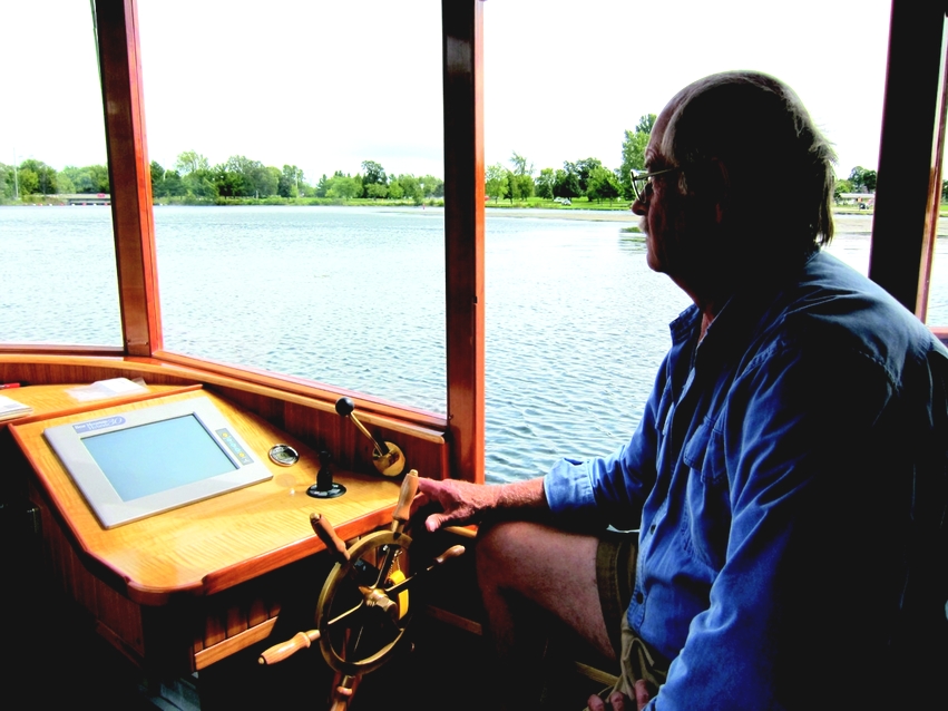 Ted Moores piloting Sparks on the Rideau Canal in 2010.