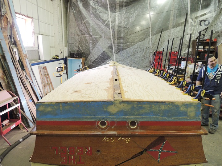 The bottom of the Chris Craft restored with new plywood.