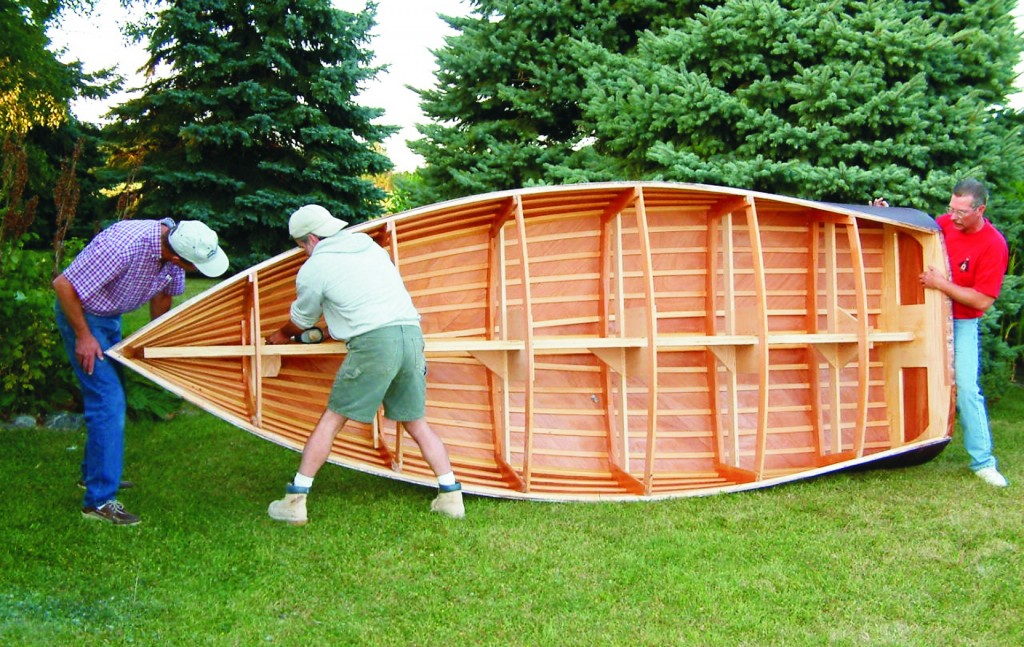 Rolling the hull to begin work on the deck was easy enough for three guys.