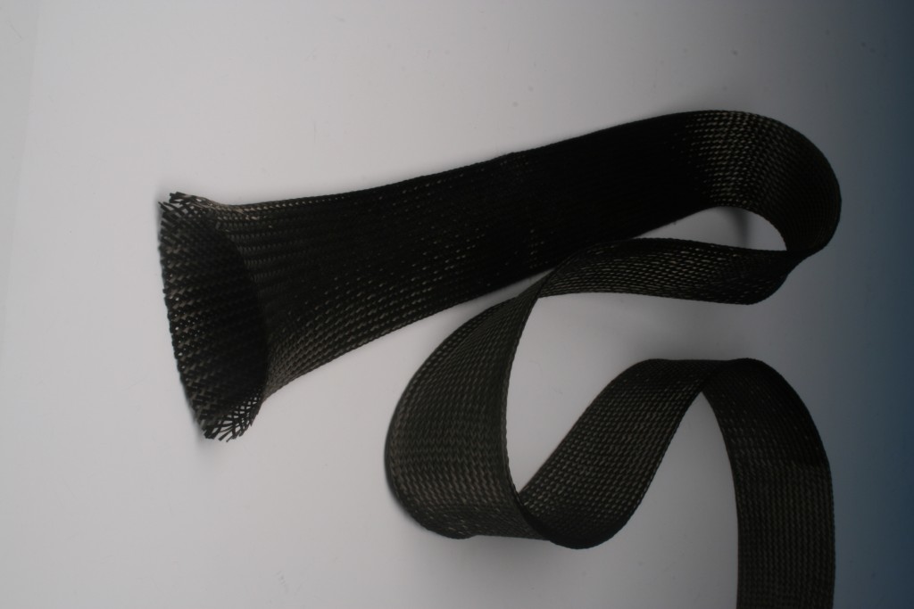 Typical braided tube of carbon fiber. The length-to-diameter ratio can be altered like a joke finger trap.