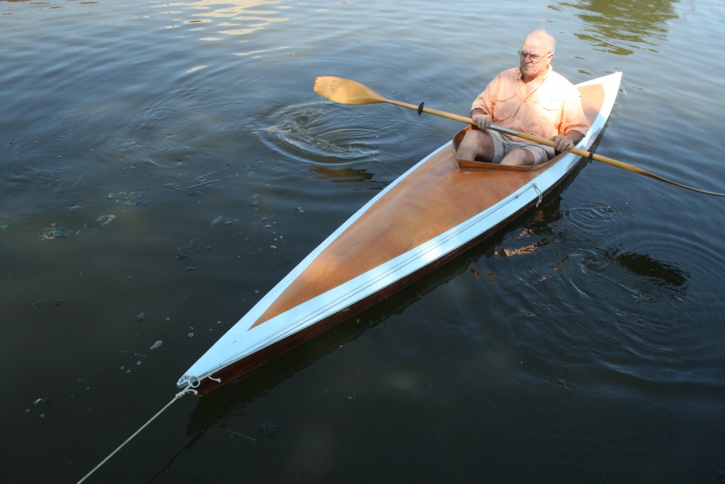 To retrieve while seated in the cockpit, I pull the ring aft and take in the anchor line and anchor
