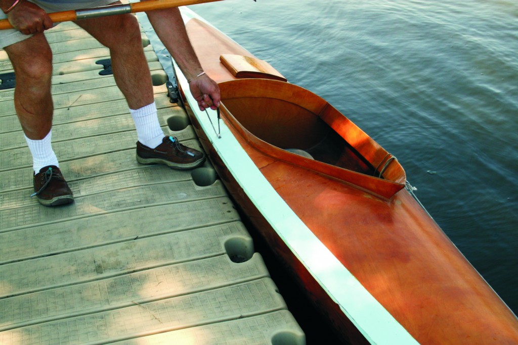 Grab the loops on the kayak, especially those positioned amidships.