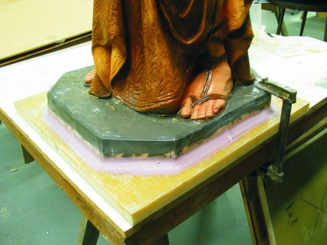 5—After the pedestal was lowered onto the bead of epoxy, a large fillet was created around the exterior of the joint